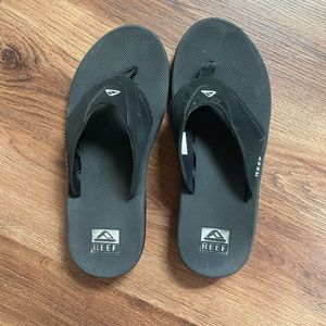 Men’s Black Reef Flip Flops Size 10 with bottle cap opener